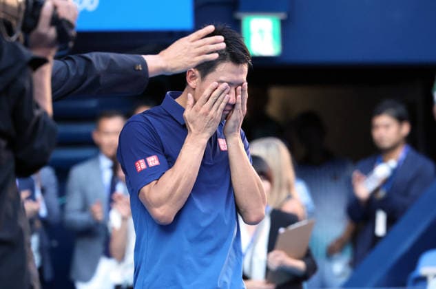 October 1, 2026, Tokyo, Japan - Japan s Kei Nishikori covers his face with his ha cries after the first round match of the Japan Open tennis championship at the Ariake Colosseum in Tokyo on Thursday, October 1, 2026. Nishikori was defeated by Frances Tiafoe of the United States and closed his professional carrier. (photo by Yoshio Tsunoda AFLO) Noxthirdxpartyxsales  0868334143st YoshioxTsunodax