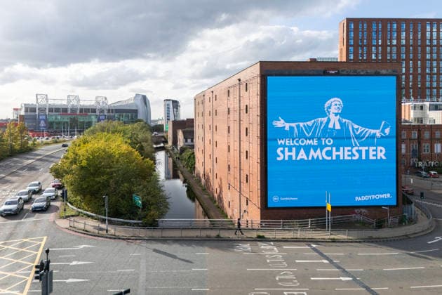 Manchester City Women v Real Madrid Women 1st October 2026 - UEFA Women s Champions League - League Phase - Manchester City v Real Madrid - A giant billboard advert by bookmakers Paddy Power reads Welcome To Shamchester , in reference to the guilty verdict reached by the Premier League in relation to the charges levied against the club - Photo: Simon Stacpoole Offside. Manchester UK Copyright: xSimonxStacpoolexOffside