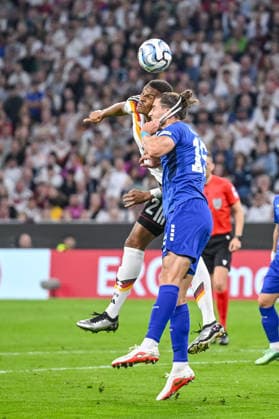 Malick Thiaw (Germany) and Srdan Babic (Serbia) battle for the ball during the UEFA Nations League 2026 27 group phase match between Germany and Serbia at Allianz Arena on October 1, 2026 in Munich, Germany. (Photo by Harry Langer DeFodi Images) -