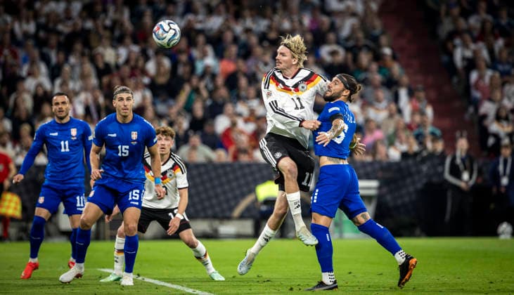 Munich Germany. 01st Oct 2026. Nick Woltemade (DFB) Nemanja Gudelj (SRB) Germany - Serbia Deutschland - Serbien 01.10.2026