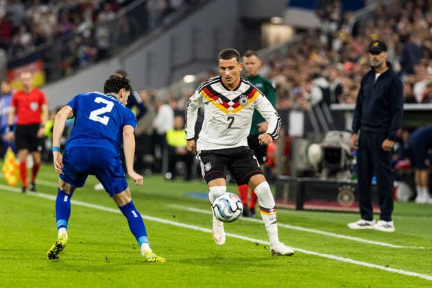 MUNICH, GERMANY - OCTOBER 01: Said El Mala (Germany, 7) controls the ball against Kosta Nedeljkovic (Serbia, 2) during the UEFA Nations League match between Germany vs. Serbia at Allianz Arena on matchday 3 of the UEFA Nations League on October 01, 2026 in Munich, Germany. Bavaria Germany Copyright: xSteffiexWunderlx