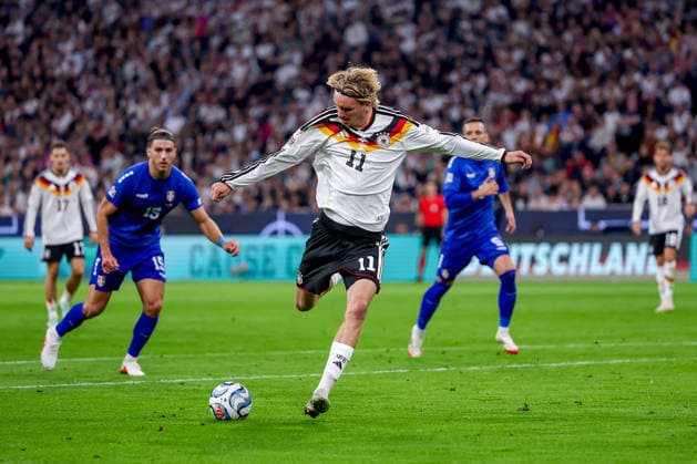 01.10.2026, Fußball, Länderspiel, Deutschland - Serbien, UEFA Nations League 2026 2027, 3.Spieltag, Allianz Arena (München), Saison 2026 27: Nick Woltemade (GER 11) beim Schuss auf das Tor DFB regulations prohibit any use of photographs as image sequences and or quasi-video. Bayern Deutschland