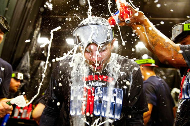 Atlanta Braves third baseman Austin Riley (27) is doused in beer to celebrate after the Braves defeated the Philadelphia Phillies in game three of the MLB, Baseball Herren, USA National League Wild Card round at Truist Park in Atlanta, Georgia on Thursday, October 1, 2026.  ATL20261001337 MIKExZARRILLI