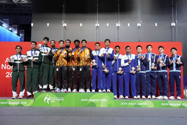(261002) -- NAGOYA, Oct. 2, 2026 -- Gold medalist team Malaysia, silver medalist team Pakistan, and bronze medalists team Hong Kong of China and team India pose during the awarding ceremony for the Men s Team of Squash at the 20th Asian Games Aichi-Nagoya 2026 in Nagoya, Japan, Oct. 2, 2026. ) (SP)JAPAN-NAGOYA-ASIAN GAMES-SQUASH-MEN S TEAM JiaxYuchen 