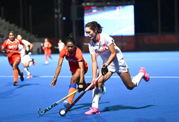 (261002) -- GIFU, Oct. 2, 2026 -- Chen Yang (R) of China breaks through during the women hockey final match between China and India at 20th Asian Games Aichi-Nagoya 2026 in Gifu, Japan, Oct. 2, 2026. ) (SP)JAPAN-GIFU-ASIAN GAMES-HOCKEY-WOMEN-FINAL LiuxLei 