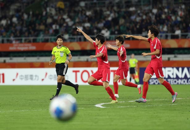 (261002) -- FUKUROI, Oct. 2, 2026 -- Players of DPRK gesture for a VAR review during the women s final match of football between Japan and the Democratic People s Republic of Korea (DPRK) at 20th Asian Games Aichi-Nagoya 2026 in Fukuroi of Shizuoka Prefecture, Japan, Oct. 2, 2026. ) (SP)JAPAN-FUKUROI-ASIAN GAMES-FOOTBALL-WOMEN FINAL-PRK VS JPN JiaxHaocheng 