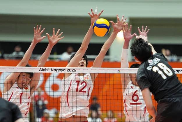 (261002) -- OKAZAKI, Oct. 2, 2026 -- Zhang Zhejia (2nd L) of China blocks a spike from Nishiyama Hiroto (1st R) of Japan during the men s volleyball semifinal match between China and Japan at the 20th Asian Games Aichi-Nagoya 2026 in Okazaki of Aichi Prefecture, Japan, Oct. 2, 2026. ) (SP)JAPAN-OKAZAKI-ASIAN GAMES-VOLLEYBALL-MEN-SEMIFINAL-JPN VS CHN CheongxKamxKa 