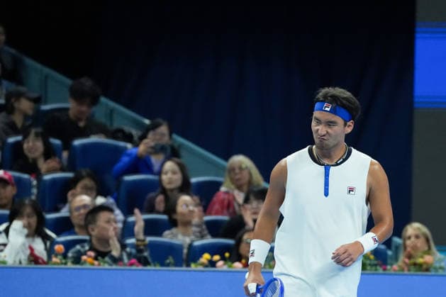 (261002) -- BEIJING, Oct. 2, 2026 -- Bu Yunchaokete of China celebrates during the men s singles second round match between Bu Yunchaokete of China and Novak Djokovic of Serbia at 2026 China Open tennis tournament in Beijing, China, Oct. 2, 2026. ) (SP)CHINA-BEIJING-TENNIS-CHINA OPEN-MEN S SINGLES(CN) JuxHuanzong 