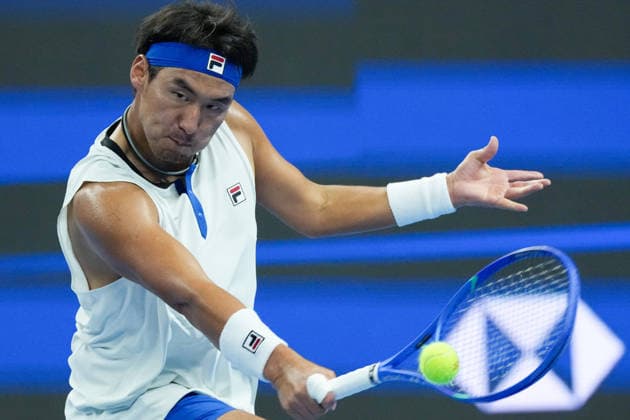(261002) -- BEIJING, Oct. 2, 2026 -- Bu Yunchaokete of China hits a return during the men s singles second round match between Bu Yunchaokete of China and Novak Djokovic of Serbia at 2026 China Open tennis tournament in Beijing, China, Oct. 2, 2026. ) (SP)CHINA-BEIJING-TENNIS-CHINA OPEN-MEN S SINGLES(CN) JuxHuanzong 