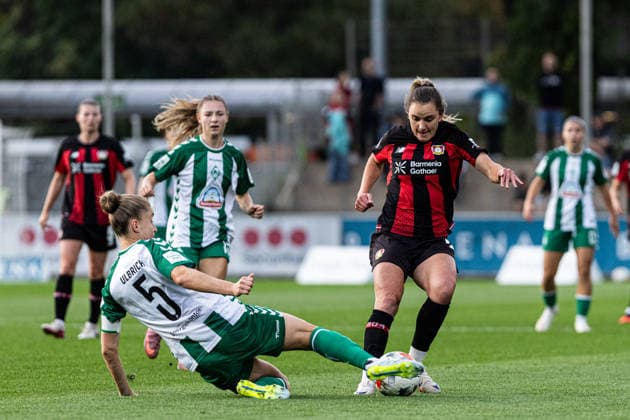 Google Pixel Frauen-Bundesliga: Bayer 04 Leverkusen Frauen - SV Werder Bremen Frauen; 02.10.2026 Michelle Ulbrich (SV Werder Bremen Frauen, 5), Paulina Tomasiak (Bayer 04 Leverkusen Frauen, 28) Google Pixel Frauen-Bundesliga: Bayer 04 Leverkusen Frauen - SV Werder Bremen Frauen; BayArena, Leverkusen, 02.10.2026 DFL regulations prohibit any use of photographs as image sequences and or quasi video. Copyright: xBEAUTIFULxSPORTS Buriakovx