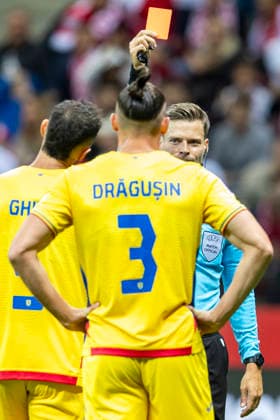 Poland v Romania - UEFA Nations League 2026 27 Radu Dragusin and referee Urs Schnyder show a red card during the 2026 27 UEFA Nations League group stage match between Poland and Romania, which took place on 2 October 2026 in Warsaw, Poland Warsaw Poland  Copyright: xAndrzejxIwanczukx originalFilename:iwanczuk-polandvr261002_npJbK.jpg