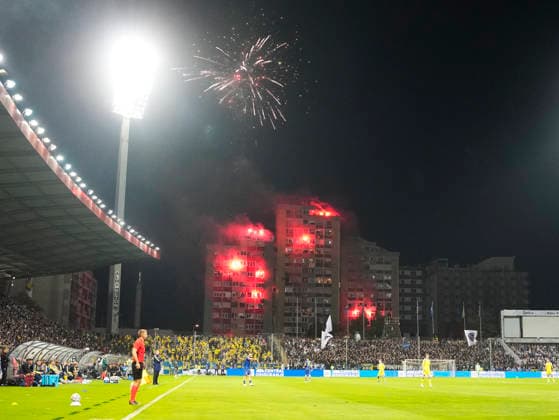 ZENICA, BOSNIA AND HERZEGOVINA 20261002 Fans who were not allowed into the stadium light flares outside during Friday s Nations League soccer match between Bosnia and Herzegovina and Sweden at Bilino Polje stadium in Zenica.