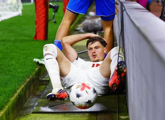 Will Lankshear of England crashes into the advertising board England U21, U 21 v Slovakia U21, UEFA European U21 Championship Qualifying, Football, bet365 Stadium, Stoke-on-Trent, UK - 02 Oct 2026Stoke-on-Trent bet365 Stadium United Kingdom  Copyright: xMattxWest Shutterstockx 17182547w