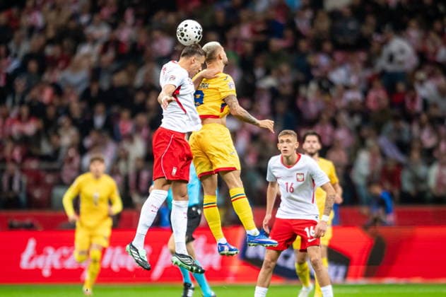 WARSAW, POLAND - OCTOBER 2: Jan Bednarek Alexandru Cicaldau during the UEFA Nations League Group B4 Round 3 MD1 match between Poland nad Romania at PGE Narodowy on October 2, 2026 in Warsaw, Poland --- Pilka nozna. Liga Narodow. Polska - Rumunia. (Photo by Kai Taller Arena Akcji) NEWSPIX.PL --- newspix.pl POLAND OUT! 