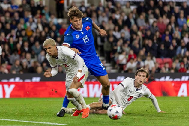 RECORD DATE NOT STATED 2nd October 2026; bet365 Stadium, Stoke-on-Trent, England; UEFA U21, U 21 Championship Qualification Football, England U21 versus Slovakia U21; Jakub Pira of Slovakia is tackled by Rico Lewis of England TimxWilliams