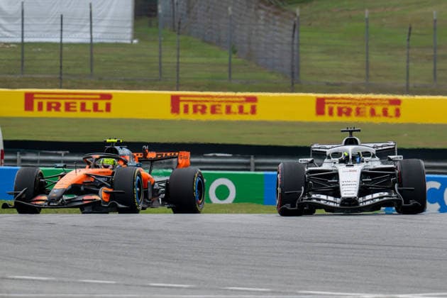 3rd October 2026; Sepang IC, Kuala Lumpur, Malaysia; Formula 1, Bahrain Grand Prix, Qualifying Day; Lando Norris (1) of Great Britain and McLaren Mastercard F1 Team and Sergio Perez (11) of Mexico and Cadillac Formula 1 Team race into turn 15 DavidxAsh