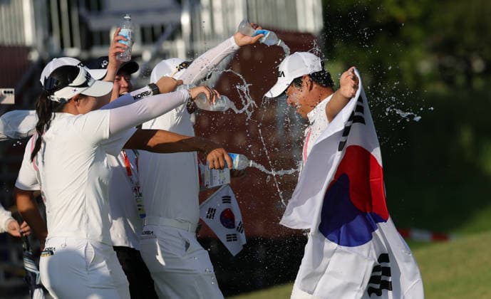 (261003) -- KASUGAI, Oct. 3, 2026 -- Kim Joohyung (R) of South Korea celebrates after the Men s Individual Stroke Play Round 4 of Golf at 20th Asian Games Aichi-Nagoya 2026 in Kasugai of Aichi Prefecture, Japan, Oct. 3, 2026. ) (SP)JAPAN-KASUGAI-ASIAN GAMES-GOLF-MEN S INDIVIDUAL STROKE PLAY LixBo 