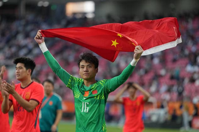 (261003) -- TOYOTA, Oct. 3, 2026 -- Li Hao, goalkeeper of China celebrates after winning the men s 3rd place match of football between China and Uzbekistan at 20th Asian Games Aichi-Nagoya 2026 in Toyota of Aichi Prefecture, Japan, Oct. 3, 2026. ) (SP)JAPAN-TOYOTA-ASIAN GAMES-FOOTBALL-MEN S 3RD PLACE MATCH-CHN VS UZB LuixSiuxWai 
