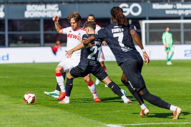 KOELN, GERMANY - OCTOBER 3, 2026: Jan Thielmann (1. FC Köln, 29) and Lucas Wolf (FC Viktoria Köln, 21) during the friendly match between FC Viktoria Köln vs. 1. FC Köln at the Sportpark Hoehenberg on October 3, 2026 in Koeln, Germany. DFL REGULATIONS PROHIBIT ANY USE OF PHOTOGRAPHS AS IMAGE SEQUENCES AND OR QUASI-VIDEO. Nordrhein-Westfalen Germany Copyright: xLeahxKohringx