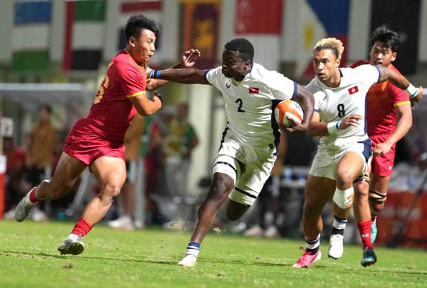(261003) -- NAGOYA, Oct. 3, 2026 -- Juan Esono Mba Oyana (2nd L) of Hong Kong of China competes during the men s gold medal match of rugby sevens between China and Hong Kong of China at the 20th Asian Games Aichi-Nagoya 2026 in Nagoya, Japan, Oct. 3, 2026. ) (SP)JAPAN-NAGOYA-ASIAN GAMES-RUGBY SEVENS-MEN-FINAL ZhangxHaobo 
