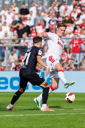 KOELN, GERMANY - OCTOBER 3, 2026: Marius Bülter (1. FC Köln, 30) and Lucas Wolf (FC Viktoria Köln, 21) during the friendly match between FC Viktoria Köln vs. 1. FC Köln at the Sportpark Hoehenberg on October 3, 2026 in Koeln, Germany. DFL REGULATIONS PROHIBIT ANY USE OF PHOTOGRAPHS AS IMAGE SEQUENCES AND OR QUASI-VIDEO. Nordrhein-Westfalen Germany Copyright: xLeahxKohringx