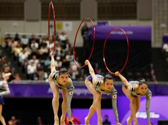 (261003) -- NAGOYA, Oct. 3, 2026 -- Players of team Japan compete during the 3 Hoops and 2 Clubs of the Group All-Around of Rhythmic gymnastics, Rhythmische Sportgymnastik, RSG at 20th Asian Games Aichi-Nagoya 2026 in Nagoya, Japan, Oct. 3, 2026. ) (SP)JAPAN-NAGOYA-ASIAN GAMES-RHYTHMIC GYMNASTICS-GROUP ALL-AROUND-FINAL WuxZhizun 
