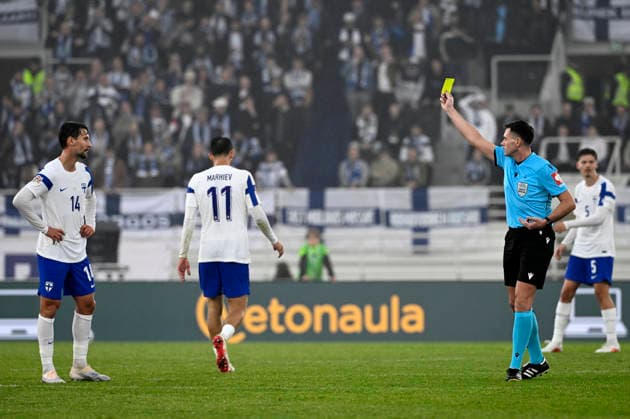 LKS 20261003 Kaan Kairinen (L) of Finland is cautioned yellow card by the referee during the UEFA Nations League Group C1 football match between Finland and Albania in Helsinki, Finland, on October 3, 2026. - EMMI KORHONEN Helsinki Finland 52XqqZyA5-s  Copyright: xEmmixKorhonenx 52XqqZyA5-s