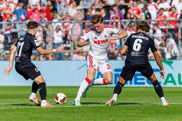 KOELN, GERMANY - OCTOBER 3, 2026: Marius Bülter (1. FC Köln, 30), Tobias Eisenhuth (FC Viktoria Köln, 6) and Lucas Wolf (FC Viktoria Köln, 21) during the friendly match between FC Viktoria Köln vs. 1. FC Köln at the Sportpark Hoehenberg on October 3, 2026 in Koeln, Germany. DFL REGULATIONS PROHIBIT ANY USE OF PHOTOGRAPHS AS IMAGE SEQUENCES AND OR QUASI-VIDEO. Nordrhein-Westfalen Germany Copyright: xLeahxKohringx