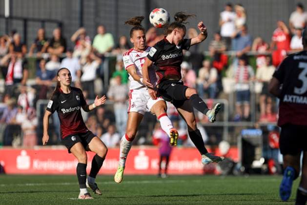 Dora Zeller (1. FC Koeln) und Lisa Kolb (SC Freiburg) im Zweikampf waehrend des Spiels der Frauen Bundesliga zwischen 1.FC Koeln und SC Freiburg, Franz-Kremer-Stadion am 03. October 2026 in Koeln, Deutschland. (Foto von Oliver Kaelke DeFodi Images) +++ Dora Zeller (1. FC Koeln) und Lisa Kolb (SC Freiburg) battle for the ball during the Bundesliga match between 1.FC Koeln and SC Freiburg at Franz-Kremer-Stadion on October 3, 2026 in Cologne, Germany. (Photo by Oliver Kaelke DeFodi Images) DFB DFL REGULATIONS PROHIBIT ANY USE OF PHOTOGRAPHS AS IMAGE SEQUENCES AND OR QUASI-VIDEO. (Photo by Oliver Kaelke DeFodi Images) -