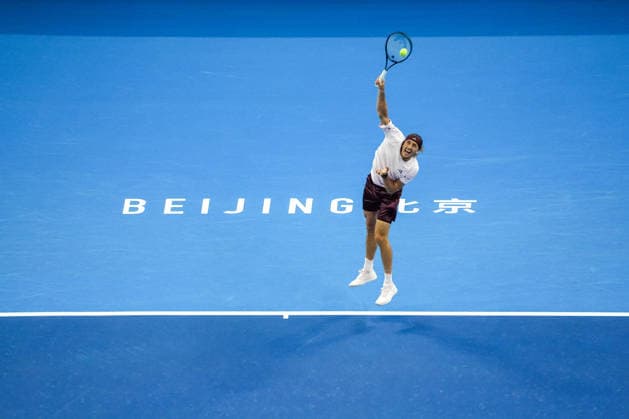 (261003) -- BEIJING, Oct. 3, 2026 -- Alexander Zverev of Germany serves to Shang Juncheng of China during the men s singles second round match at 2026 China Open tennis tournament in Beijing, China, Oct. 3, 2026. ) (SP)CHINA-BEIJING-TENNIS-CHINA OPEN-MEN S SINGLES(CN) XiexHan 