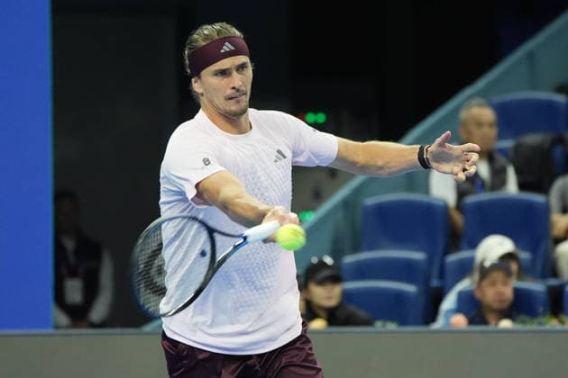 (261003) -- BEIJING, Oct. 3, 2026 -- Alexander Zverev of Germany hits a return to Shang Juncheng of China during the men s singles second round match at 2026 China Open tennis tournament in Beijing, China, Oct. 3, 2026. ) (SP)CHINA-BEIJING-TENNIS-CHINA OPEN-MEN S SINGLES(CN) XiexHan 