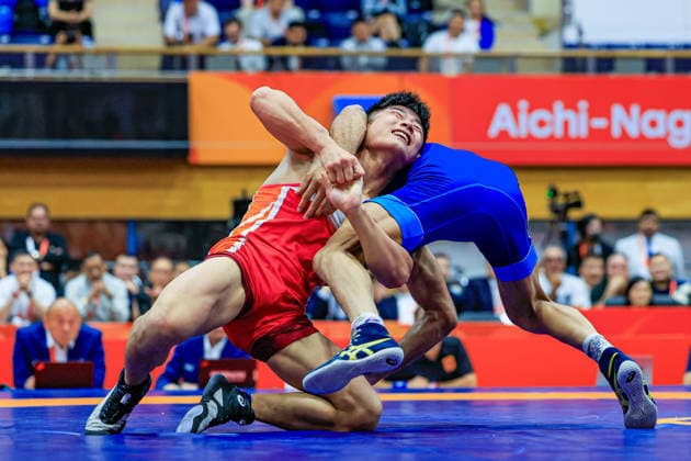 Asian Games 57kg FS - Aman Aman (IND) df. Chongsong Han (PRK) Copyright: xAmirrezaxAliasgarix