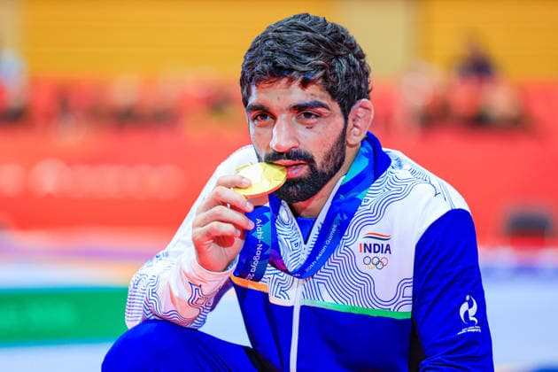 Asian Games Podium 57kg FS - Gold: Aman Aman (IND) Copyright: xAmirrezaxAliasgarix