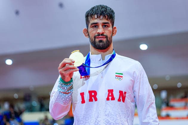 Asian Games Podium 74kg FS - Gold: Yones Aliakbar Emamichoghaei (IRI) Copyright: xAmirrezaxAliasgarix