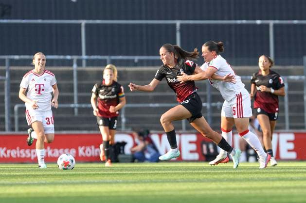Maj Schneider (SC Freiburg) und Amelie Bohnen (1. FC Koeln) im Zweikampf waehrend des Spiels der Frauen Bundesliga zwischen 1.FC Koeln und SC Freiburg, Franz-Kremer-Stadion am 03. October 2026 in Koeln, Deutschland. (Foto von Oliver Kaelke DeFodi Images) +++ Maj Schneider (SC Freiburg) und Amelie Bohnen (1. FC Koeln) battle for the ball during the Bundesliga match between 1.FC Koeln and SC Freiburg at Franz-Kremer-Stadion on October 3, 2026 in Cologne, Germany. (Photo by Oliver Kaelke DeFodi Images) DFB DFL REGULATIONS PROHIBIT ANY USE OF PHOTOGRAPHS AS IMAGE SEQUENCES AND OR QUASI-VIDEO. (Photo by Oliver Kaelke DeFodi Images) -