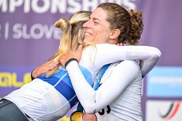 Dutch Demi Vollering and Swiss Marlen Reusser pictured on the podium after the elite women Road Race race (130 km) at the cycling UEC Road European Championships, in Ljubljana, Slovenia Saturday 3 October 2026. The UEC Road European Championships are taking place from 02 to 07 October in Ljubljana, Slovenia. DAVIDxPINTENS  x188624432x