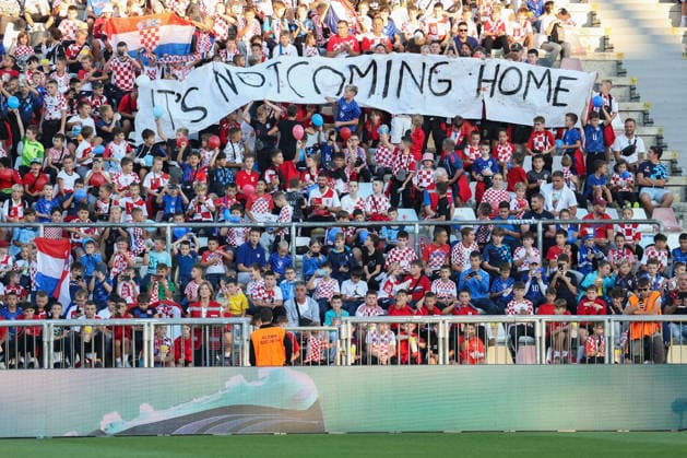 Rijeka, Croatia, 3rd October 2026. UEFA Nations League. Matchday 3, Group A3. Croatia v England at Rujevica, Rijeka. Young Croatian supporters at stad holding It™s not coming home banner. Croatia v England, UEFA Nations League. 