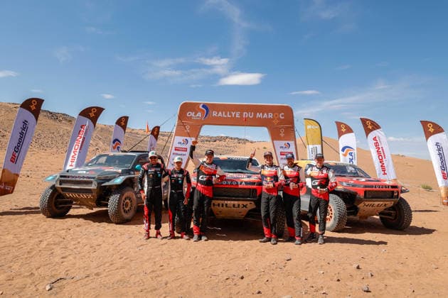 W2RC - RALLYE DU MAROC 2026 240 FERREIRA Joao (por), PALMEIRO Filipe (por), Toyota Hilux IMT Evo, Toyota Gazoo Racing SA, FIA W2RC, ULT T1+, action, 203 QUINTERO Seth (usa), SHORT Andrew (usa), Toyota Hilux GR, Toyota Gazoo Racing W2RC, FIA W2RC, ULT T1+, action, 202 LATEGAN Henk (rsa), CUMMINGS Brett (rsa), Toyota Hilux GR, Toyota Gazoo Racing W2RC, FIA W2RC,ULT T1+, action Finisher podium, portrait during the Stage 5 of the Rallye du Maroc 2026, 4th round of the 2026 WR2C Championship from October 3, 2026 around Zagora, Morocco - AgadirMorocco Copyright: xPauloxMariax