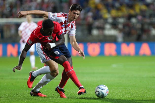 Rijeka, Croatia, 3rd October 2026. UEFA Nations League. Matchday 3, Group A3. Croatia v England at Rujevica, Rijeka. Marc GUEHI (6) and Igor MATANOVIC (20). Croatia v England, UEFA Nations League. 