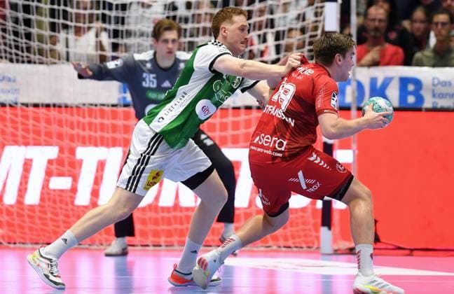 Reynir Thor Stefansson (MT Melsungen 19) (am Ball), Lukas Stutzke (TSV Hannover-Burgdorf 39), Joel Birlehm (Torwart TSV Hannover-Burgdorf 35) (hinten) , GER, MT Melsungen - TSV Hannover-Burgdorf, Handball, 1. Bundesliga, 7. Spieltag, Saison 2026 2027, 03.10.2026, GER, MT Melsungen - Hannover-Burgdorf, Handball, 1. Bundesliga, 7. Spieltag, Saison 2026 2027, 03.10.2026 Kassel Copyright: xEibner-Pressefotox xRolandxSippelx EP_RSL