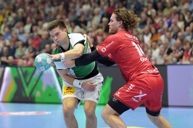 Renars Uscins (TSV Hannover-Burgdorf 10) (am Ball), Johannes Golla (MT Melsungen 14) (R) , GER, MT Melsungen - TSV Hannover-Burgdorf, Handball, 1. Bundesliga, 7. Spieltag, Saison 2026 2027, 03.10.2026, GER, MT Melsungen - Hannover-Burgdorf, Handball, 1. Bundesliga, 7. Spieltag, Saison 2026 2027, 03.10.2026 Kassel Copyright: xEibner-Pressefotox xRolandxSippelx EP_RSL