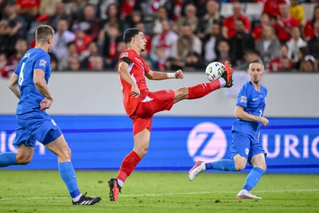 Jaka Bijol (Slovenia), Zeki Amdouni (Switzerland) and Zan Karnicnik (Slovenia) battle for the ball during the UEFA Nations League 2026 27 group phase match between Switzerland and Slovenia at Luzern Arena on October 3, 2026 in Lucerne, Switzerland. (Photo by Harry Langer DeFodi Images) -