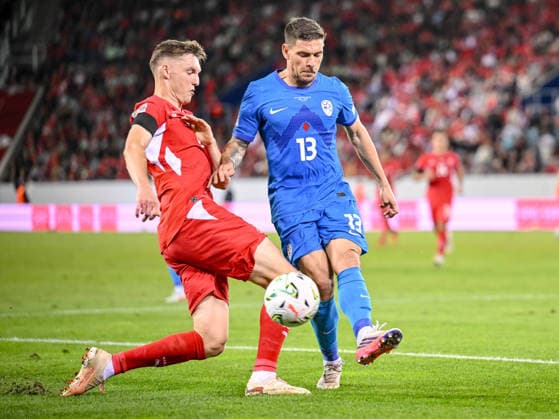 Michel Aebischer (Switzerland) and Erik Janza (Slovenia) battle for the ball during the UEFA Nations League 2026 27 group phase match between Switzerland and Slovenia at Luzern Arena on October 3, 2026 in Lucerne, Switzerland. (Photo by Harry Langer DeFodi Images) -