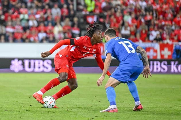 Johan Manzambi (Switzerland) and Erik Janza (Slovenia) battle for the ball during the UEFA Nations League 2026 27 group phase match between Switzerland and Slovenia at Luzern Arena on October 3, 2026 in Lucerne, Switzerland. (Photo by Harry Langer DeFodi Images) -