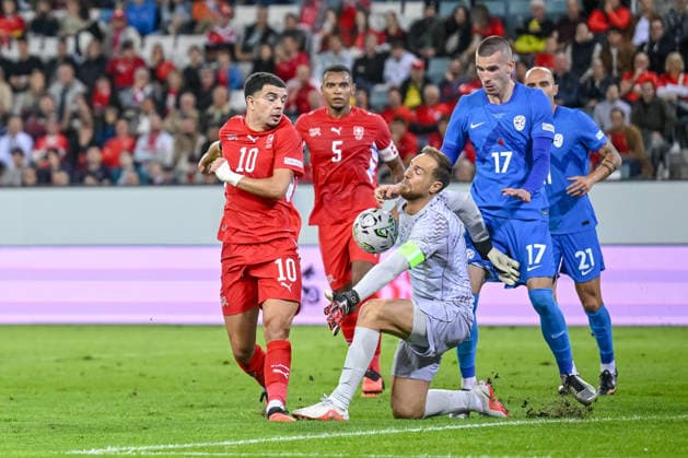 Zeki Amdouni (Switzerland) and goalkeeper Jan Oblak (Slovenia) battle for the ball during the UEFA Nations League 2026 27 group phase match between Switzerland and Slovenia at Luzern Arena on October 3, 2026 in Lucerne, Switzerland. (Photo by Harry Langer DeFodi Images) -