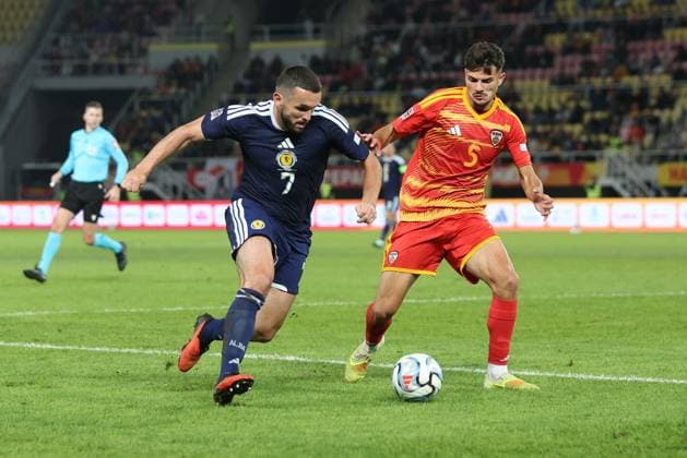 John McGinn of Scotland and Gjorge Dzhekov of North Macedonia in action. North Macedonia v Scotland, UEFA Nations League, Football, Nacionalna Arena Tose Proeski, Skopje, North Macedonia - 03 Oct 2026Skopje Nacionalna Arena Tose Proeski North Macedonia  Copyright: xNikolaxKrstic Shutterstockx 17184131dt