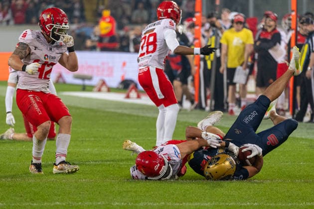 Montigo Moss (Dresden Monarchs, 81 Wide Receiver) tackled by Steven Dominik Johannes (Potsdam Royals, 27 Defensive Back) Dresden Monarchs vs Potsdam Royals, American Football, German Football League, Week 22, Championship Game, 2026, 03.10.2026, Dresden Rudolf Harbig Stadion Saxony Germany Copyright: xPFA SebastianxJustx
