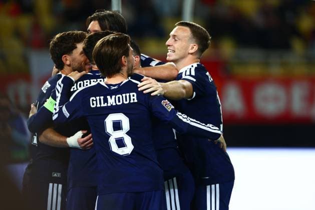 John McGinn of Scotland (hidden) celebrates with teammates after scoring a penalty to make the score 2-0. North Macedonia v Scotland, UEFA Nations League, Football, Nacionalna Arena Tose Proeski, Skopje, North Macedonia - 03 Oct 2026Skopje Nacionalna Arena Tose Proeski North Macedonia  Copyright: xNikolaxKrstic Shutterstockx 17184131fk