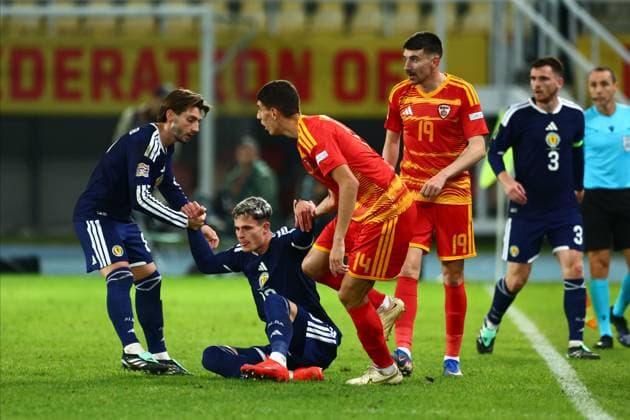 Robbie Ure of Scotland is helped off the ground. North Macedonia v Scotland, UEFA Nations League, Football, Nacionalna Arena Tose Proeski, Skopje, North Macedonia - 03 Oct 2026Skopje Nacionalna Arena Tose Proeski North Macedonia  Copyright: xNikolaxKrstic Shutterstockx 17184131ga