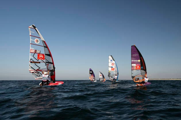 PWA - Citroen - World Windsurfing Tour Sylt 2026 - Tag 8 - Slalom Foil Men; Sylt Westerland, 03.10.2026 John Soukos (Slalom Foil Men, Greece, GRE-198); Pierre Mortefon (Slalom Foil Men, France, F-14); Amado Vrieswijk (Slalom Foil Men and Freestyle Men, Bonaire, NB-20); Maciek Rutkowski (Slalom Foil Men, Poland, POL-23); PWA - Citroen - World Windsurfing Tour Sylt 2026 - Tag 8 - Slalom Foil Men am 03.10.2026 vor dem Brandenburger Strand - Motorboot auf Sylt Westerland (Deutschland). Copyright: xBEAUTIFULxSPORTS AndreasxDickx